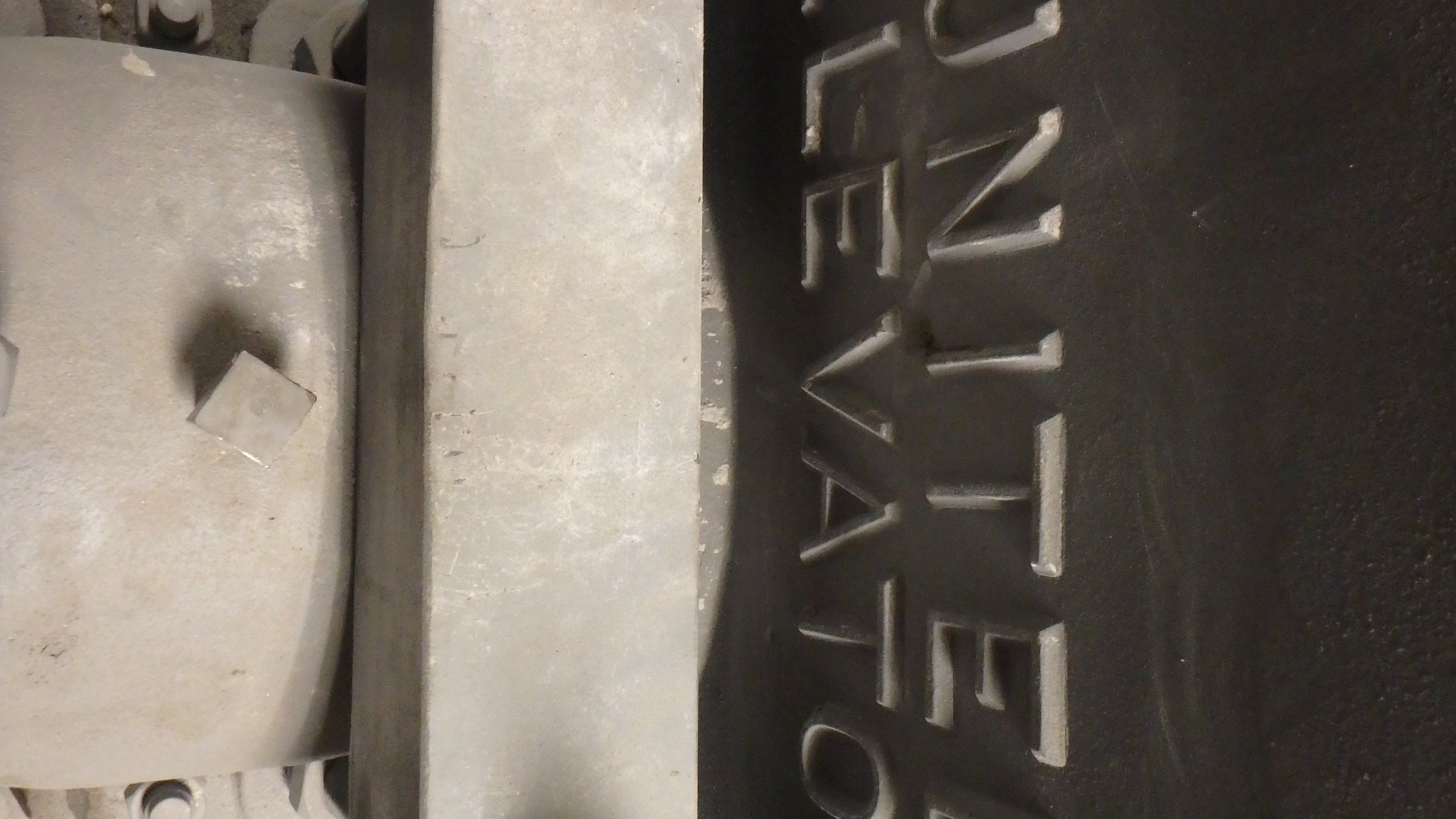 UNITED ELEVATOR cast metal mark on a vintage component